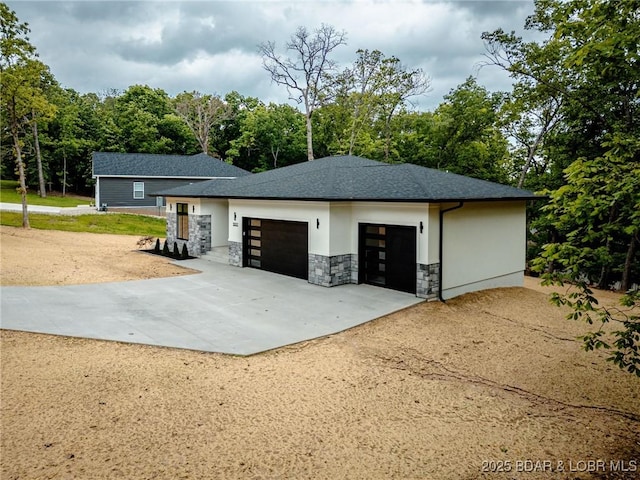 garage featuring driveway