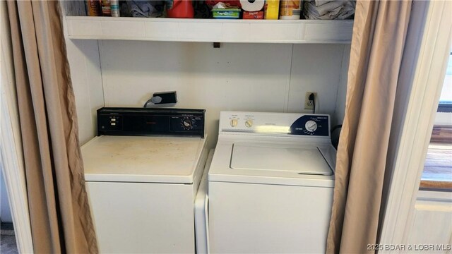washroom featuring independent washer and dryer
