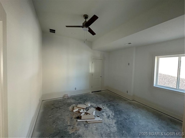spare room featuring a ceiling fan