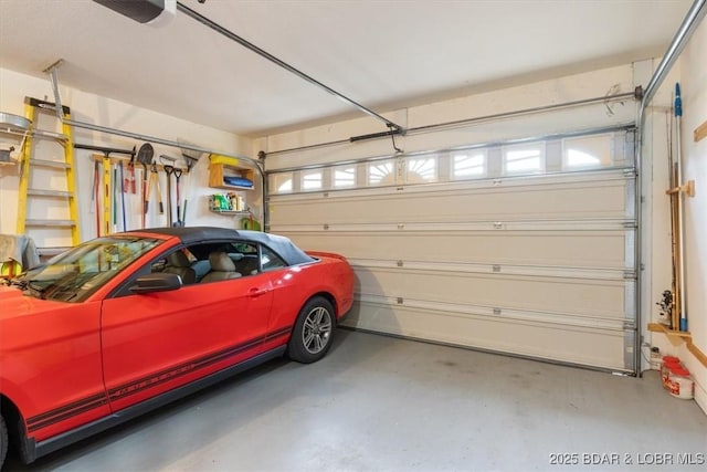 5183 Vicus Castri, Osage Beach, MO 65065 - garage with a garage door opener