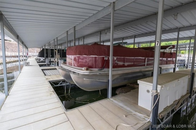 5183 Vicus Castri, Osage Beach, MO 65065 - dock area featuring boat lift