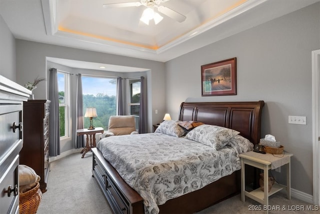 5183 Vicus Castri, Osage Beach, MO 65065 - bedroom with a raised ceiling, carpet flooring, baseboards, and a ceiling fan