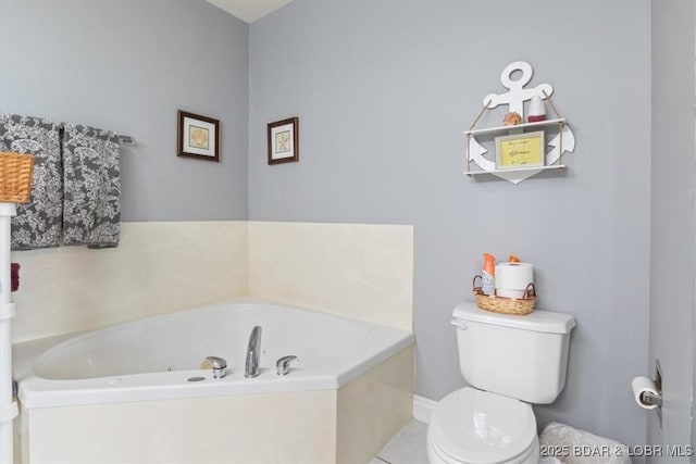 5183 Vicus Castri, Osage Beach, MO 65065 - full bath with a whirlpool tub, toilet, tile patterned flooring, and baseboards