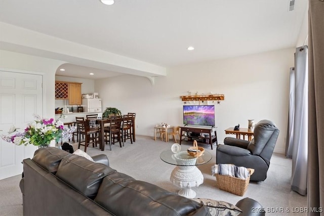 5183 Vicus Castri, Osage Beach, MO 65065 - living room featuring light carpet, recessed lighting, and arched walkways