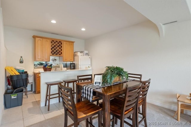 5183 Vicus Castri, Osage Beach, MO 65065 - dining area with recessed lighting, baseboards, and light tile patterned flooring