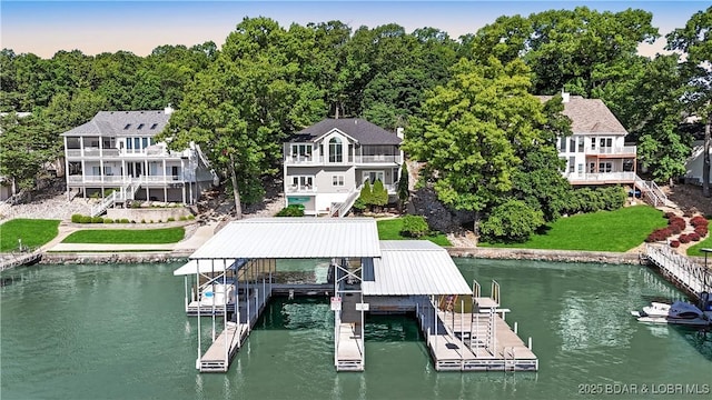 5482 Stoneledge Cir, Osage Beach, MO 65065 - dock featuring a water view, boat lift, and stairs
