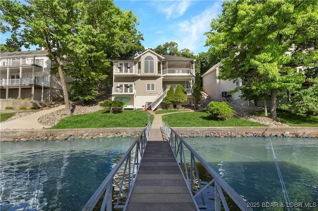 5482 Stoneledge Cir, Osage Beach, MO 65065 - back of property featuring a yard