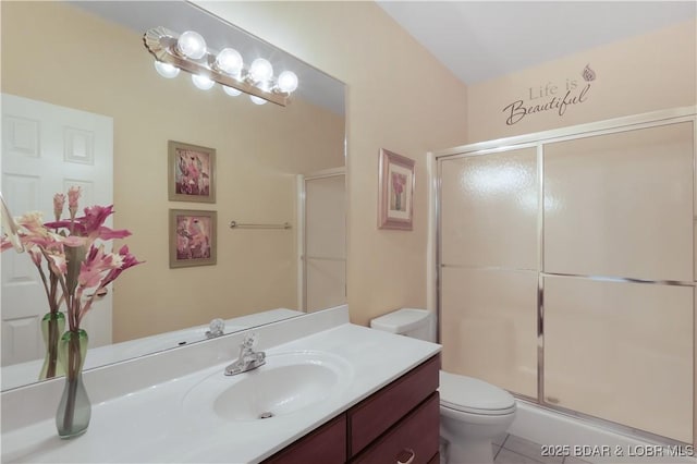 5482 Stoneledge Cir, Osage Beach, MO 65065 - bathroom with toilet, a stall shower, vanity, and tile patterned floors