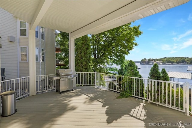 5482 Stoneledge Cir, Osage Beach, MO 65065 - wooden terrace featuring a water view and area for grilling