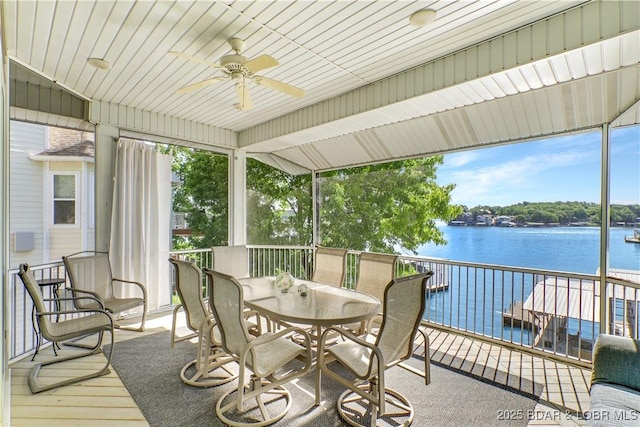 5482 Stoneledge Cir, Osage Beach, MO 65065 - sunroom / solarium with ceiling fan, a water view, outdoor dining space, and plenty of natural light