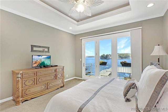 5482 Stoneledge Cir, Osage Beach, MO 65065 - bedroom with access to outside, light carpet, baseboards, a tray ceiling, and crown molding