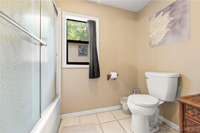 66 Old Shawnee Bend Rd, Sunrise Beach, MO 65079 - full bath with baseboards, toilet, tile patterned flooring, and shower / bath combination with glass door