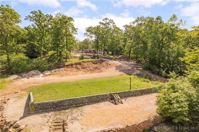 66 Old Shawnee Bend Rd, Sunrise Beach, MO 65079 - view of home's community featuring a yard