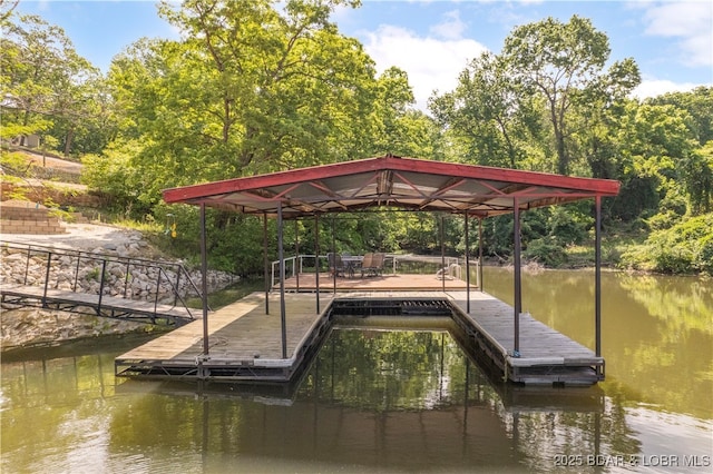 66 Old Shawnee Bend Rd, Sunrise Beach, MO 65079 - dock area with a water view and view of wooded area