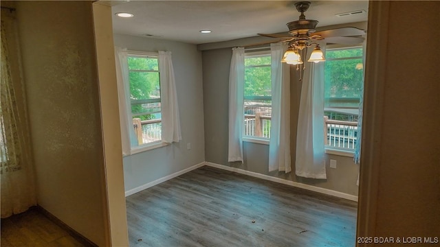 26587 Lake Front Ln, Rocky Mount, MO 65072 - unfurnished room with ceiling fan, wood finished floors, baseboards, and recessed lighting