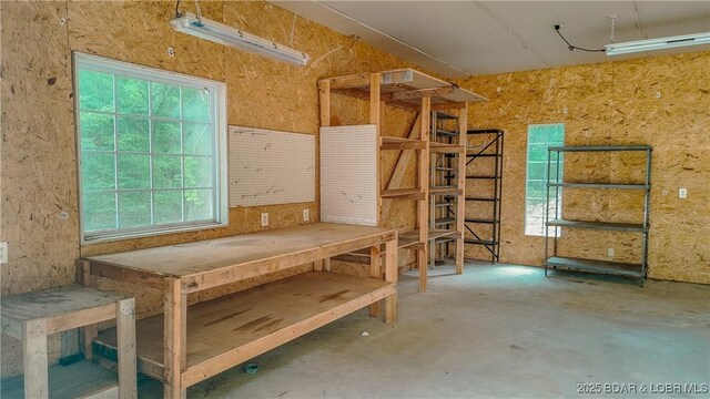 26587 Lake Front Ln, Rocky Mount, MO 65072 - misc room featuring plenty of natural light and concrete flooring