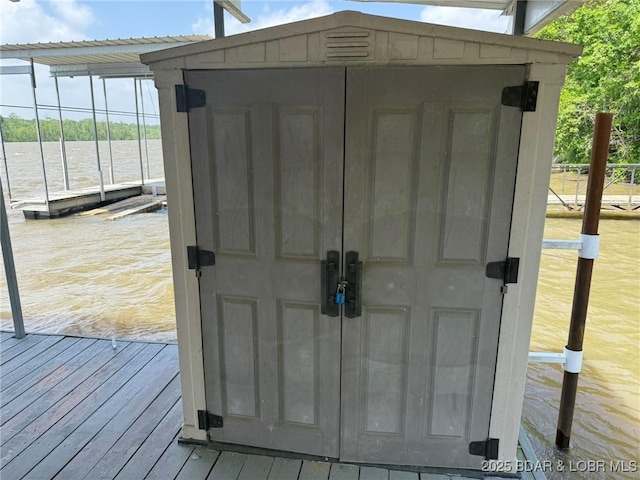 23848 Bill Bryant Dr, Warsaw, MO 65355 - view of outdoor structure featuring a water view