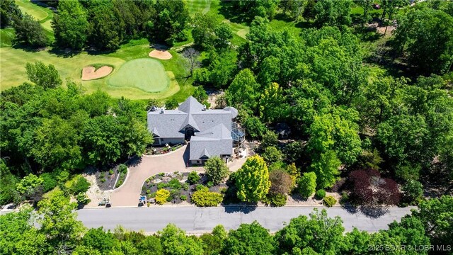126 W Cross Fox Trl, Camdenton, MO 65020 - view of property location with a golf club and a tree filled landscape
