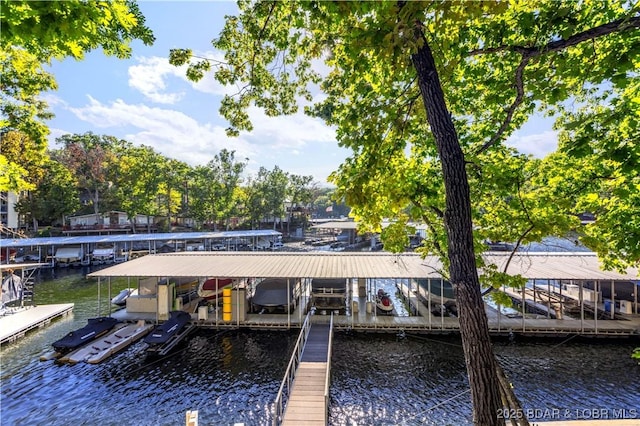 dock area featuring a water view and boat lift