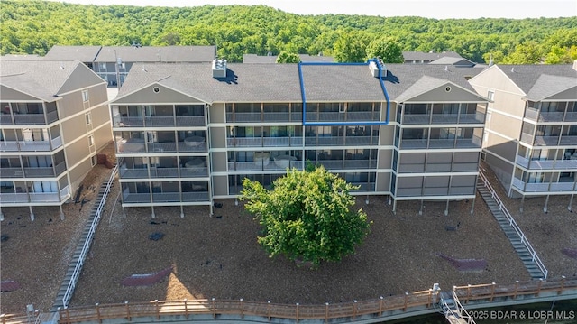 611 Lazy Days Rd Unit X-10, Osage Beach, MO 65065 - view of property with a wooded view