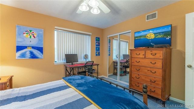 611 Lazy Days Rd Unit X-10, Osage Beach, MO 65065 - carpeted bedroom featuring a closet, baseboards, and a ceiling fan
