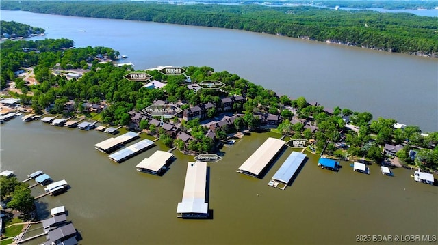 5940 Baydy Peak Rd Unit 932, Osage Beach, MO 65065 - aerial view of residential area with a forest and a large body of water