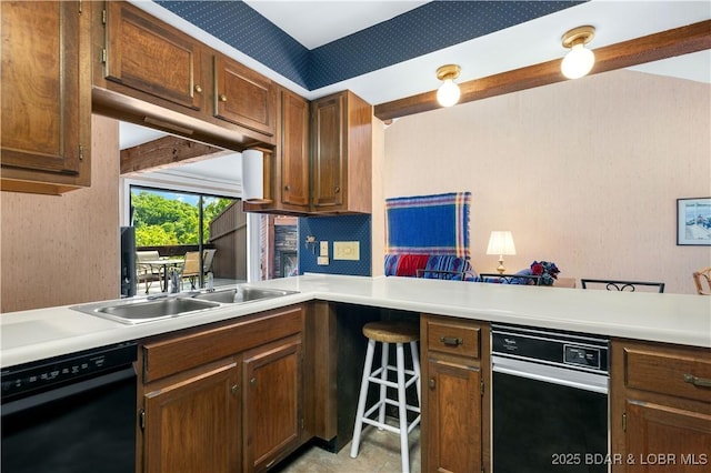 5940 Baydy Peak Rd Unit 932, Osage Beach, MO 65065 - kitchen with black dishwasher, light countertops, and a sink