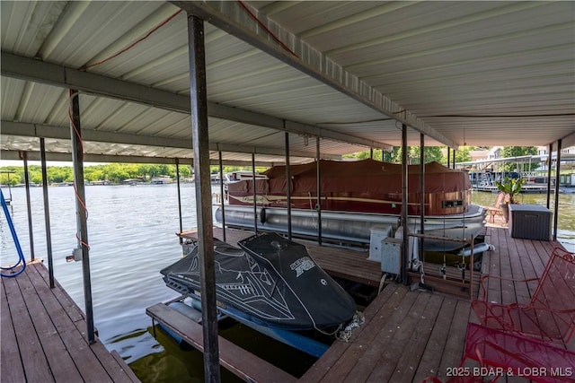 30566 Johnson Bay Dr, Gravois Mills, MO 65037 - dock area with boat lift and a water view