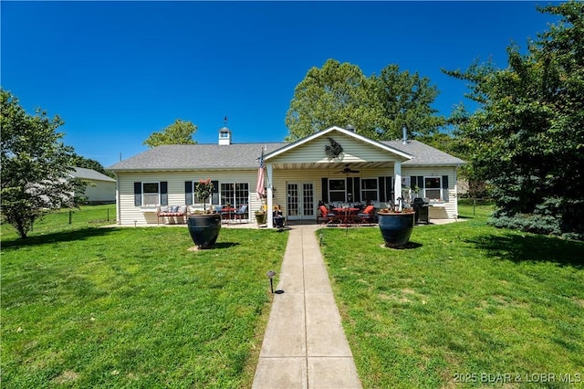 30566 Johnson Bay Dr, Gravois Mills, MO 65037 - rear view of property featuring a ceiling fan, french doors, a patio, and a lawn