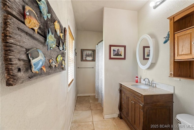 30566 Johnson Bay Dr, Gravois Mills, MO 65037 - full bathroom with vanity, tile patterned flooring, toilet, curtained shower, and baseboards