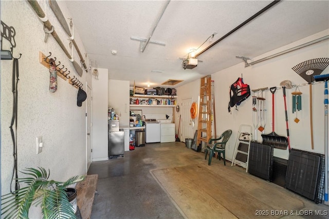 30566 Johnson Bay Dr, Gravois Mills, MO 65037 - garage featuring independent washer and dryer and refrigerator