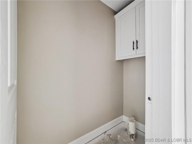 17 Eagles Pass, Climax Springs, MO 65324 - laundry room featuring baseboards