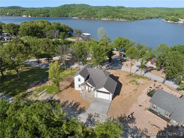 17 Eagles Pass, Climax Springs, MO 65324 - aerial view of property and surrounding area featuring a forest and a nearby body of water