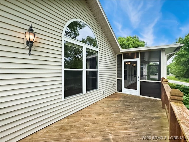 deck with a sunroom