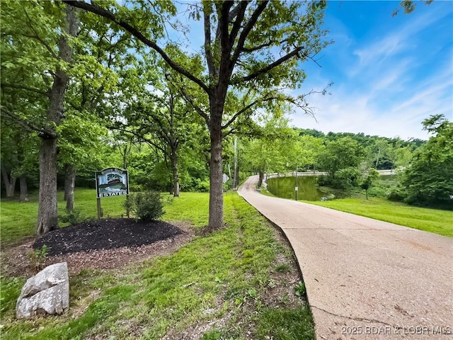 surrounding community featuring a yard