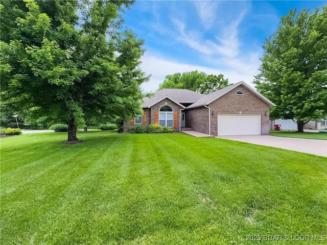 view of front facade with brick siding, a garage, a front lawn, and concrete driveway