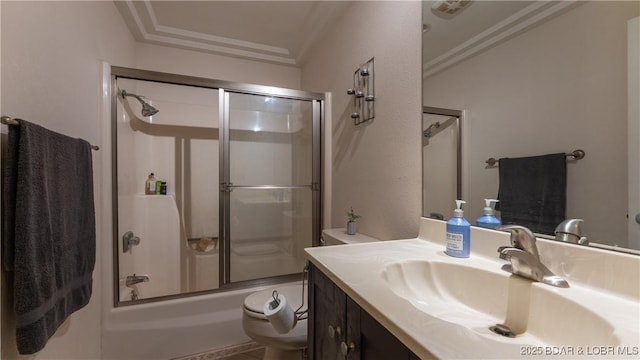 5 Hallie Ln, Kaiser, MO 65047 - bathroom featuring toilet, vanity, bath / shower combo with glass door, and ornamental molding