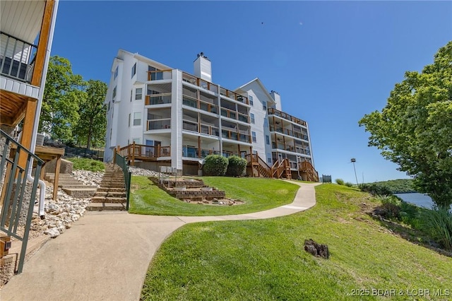 601 Park Place Dr Unit 2B, Kaiser, MO 65047 - view of apartment building / complex featuring stairs