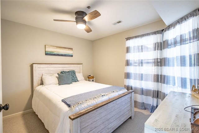 601 Park Place Dr Unit 2B, Kaiser, MO 65047 - bedroom featuring light colored carpet, baseboards, and ceiling fan