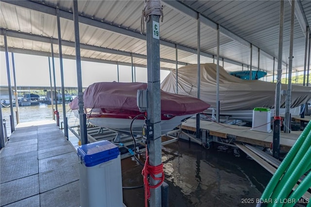 601 Park Place Dr Unit 2B, Kaiser, MO 65047 - dock with boat lift and a water view