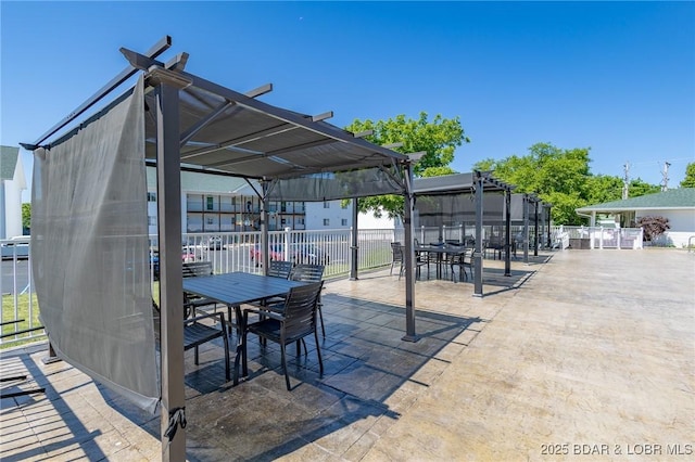 601 Park Place Dr Unit 2B, Kaiser, MO 65047 - view of patio / terrace with outdoor dining area