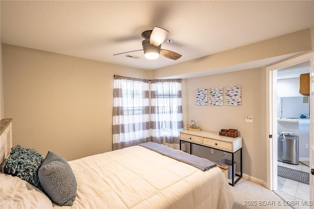 601 Park Place Dr Unit 2B, Kaiser, MO 65047 - bedroom with baseboards, a ceiling fan, and light carpet