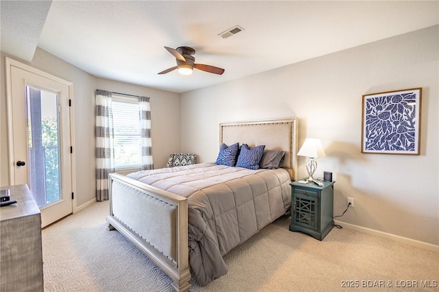 601 Park Place Dr Unit 2B, Kaiser, MO 65047 - bedroom with light carpet, baseboards, and a ceiling fan
