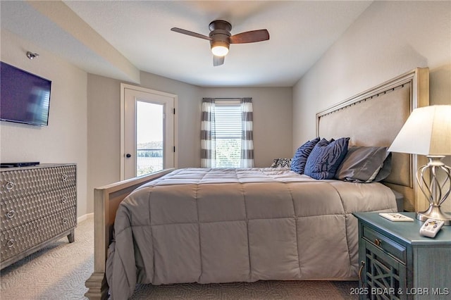 601 Park Place Dr Unit 2B, Kaiser, MO 65047 - carpeted bedroom featuring a ceiling fan and baseboards