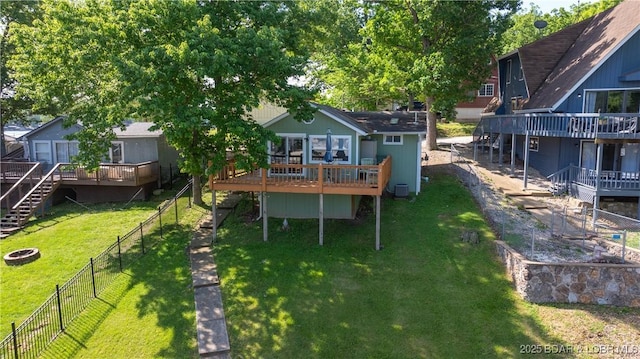 15219 Fleener Dr, Gravois Mills, MO 65037 - back of house with a deck and stairs