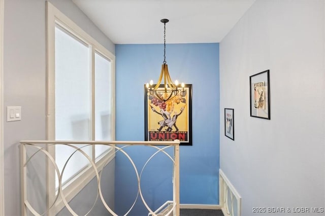 241 Shell Bay Cir Unit 1A, Linn Creek, MO 65052 - detailed view of a chandelier and baseboards