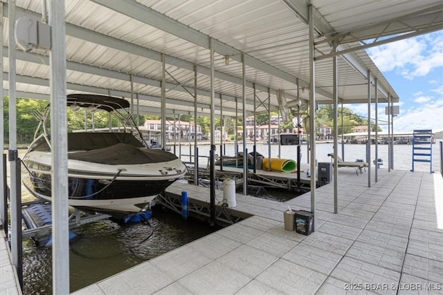 241 Shell Bay Cir Unit 1A, Linn Creek, MO 65052 - dock area with boat lift and a water view