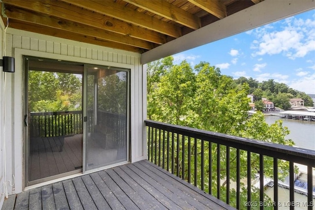 241 Shell Bay Cir Unit 1A, Linn Creek, MO 65052 - wooden terrace with a water view