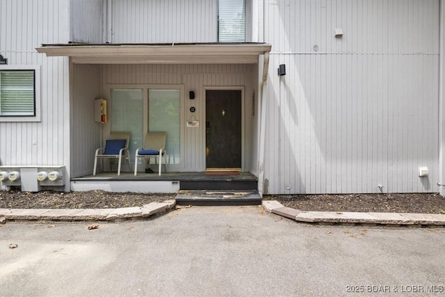 241 Shell Bay Cir Unit 1A, Linn Creek, MO 65052 - doorway to property with a porch