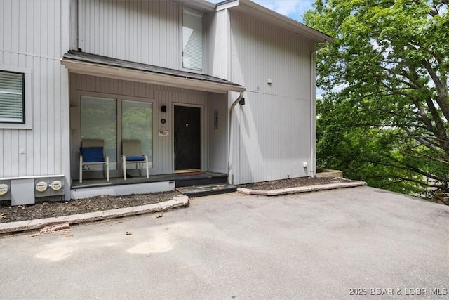 241 Shell Bay Cir Unit 1A, Linn Creek, MO 65052 - doorway to property featuring a patio